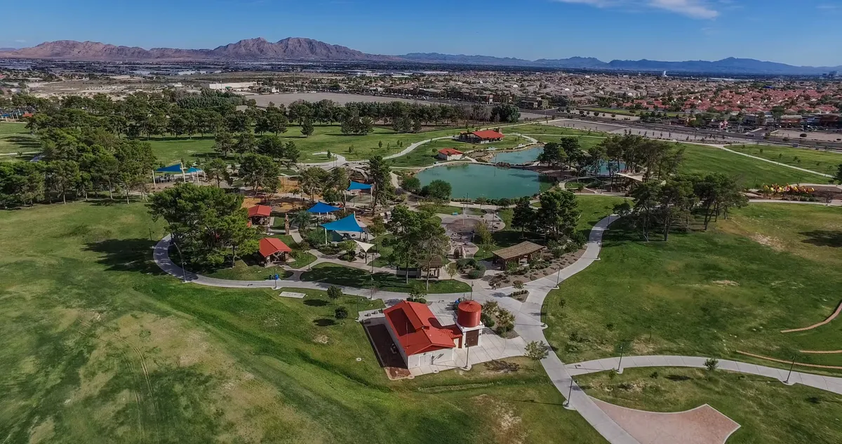 Aerial view of a North Las Vegas park with a pond and walking paths
