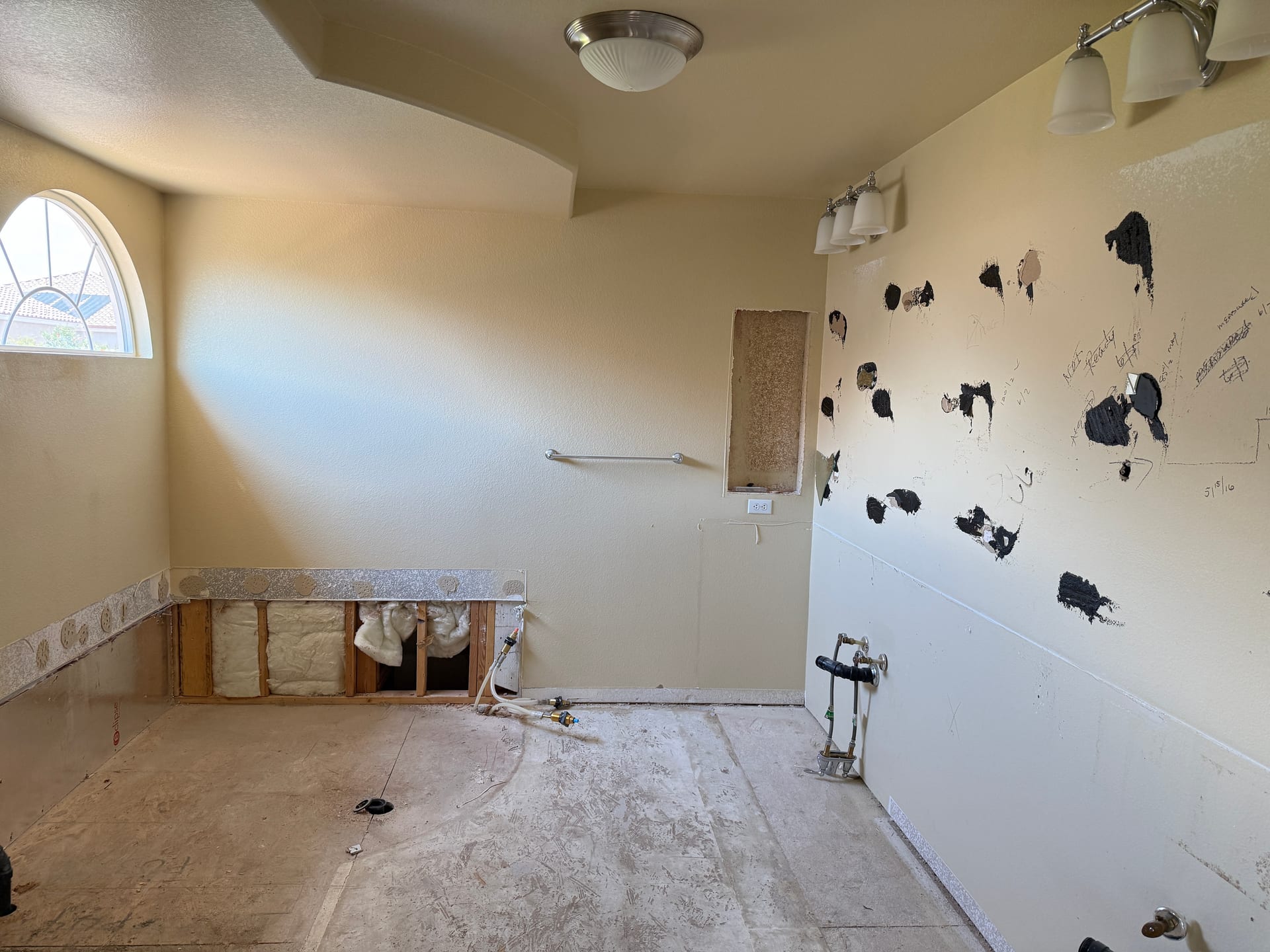 Bathroom during demolition before new tile
