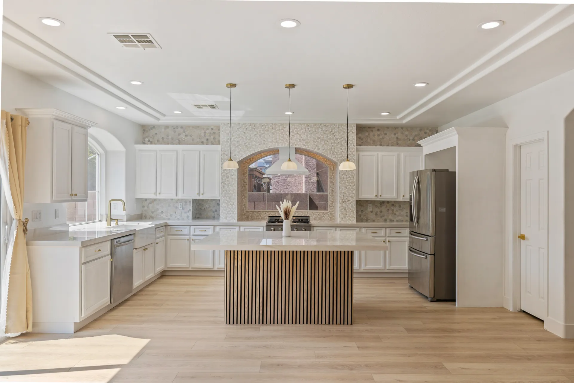 Warm wood-look plank flooring installed by our crew in a Las Vegas Valley home
